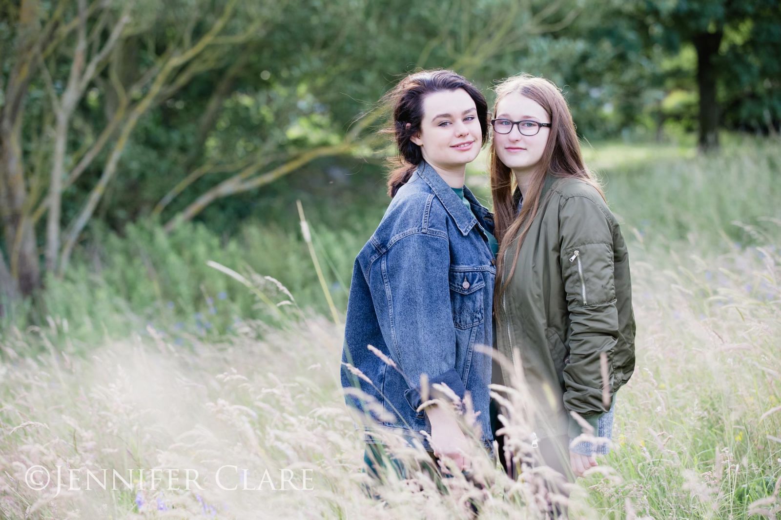 Sisters photographed in long grass in a Derby Park